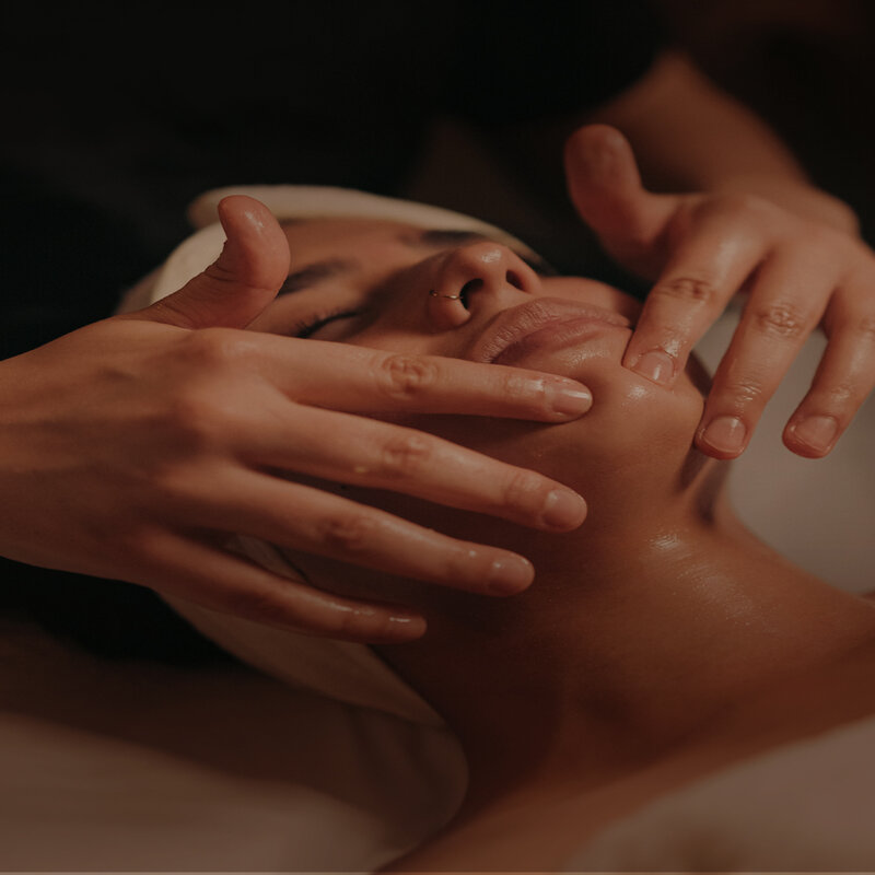 Woman getting a facial treatment.